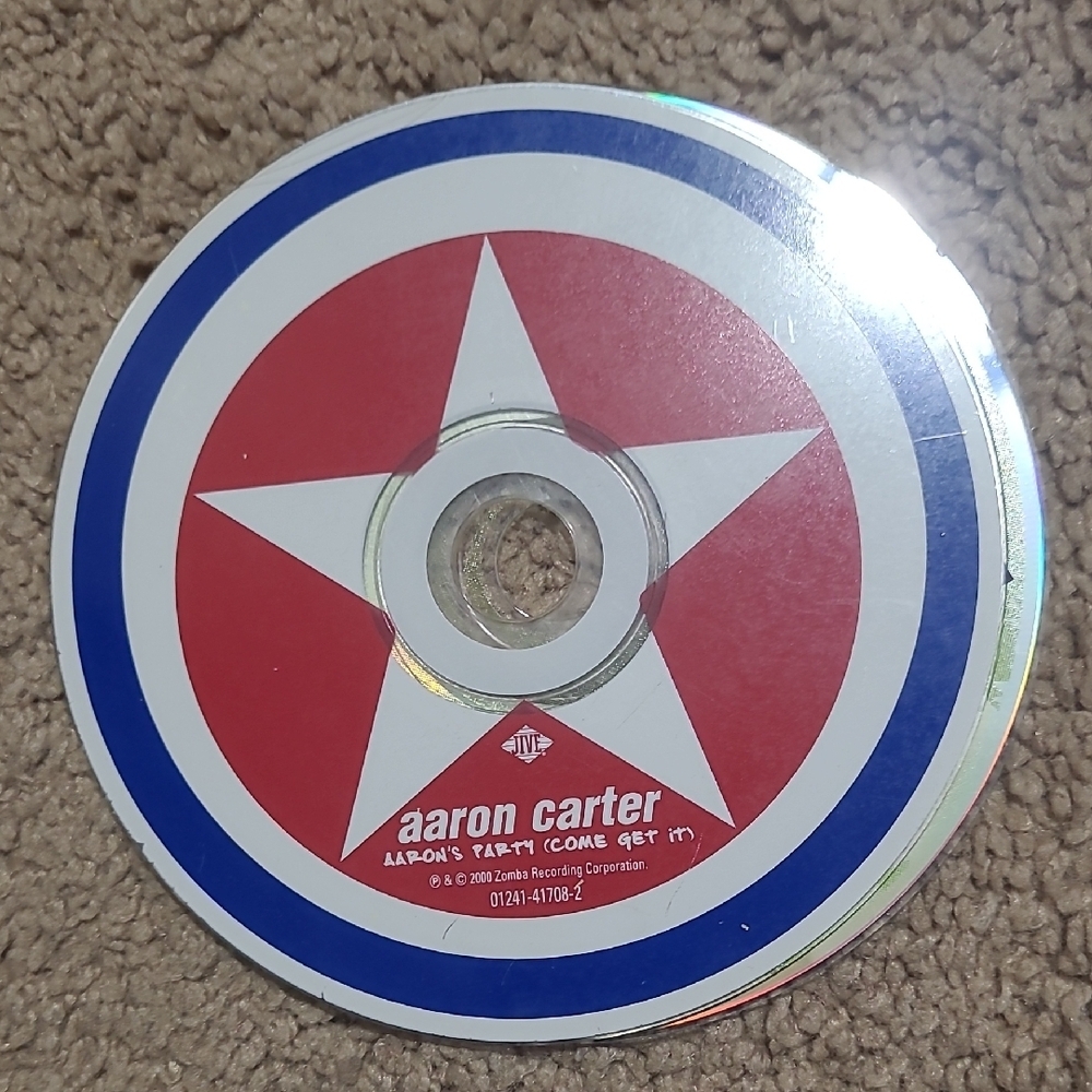 Aaron Carter CD with Red and Blue Star Design
